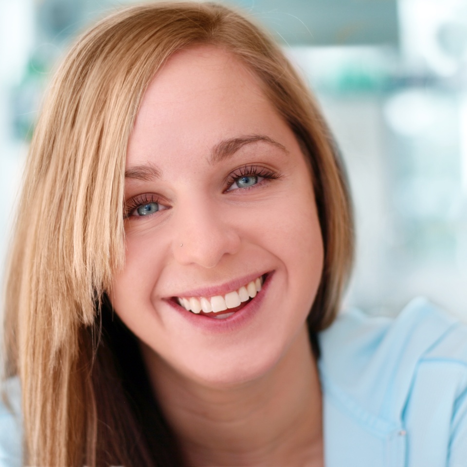 happy smiling girl with blue background